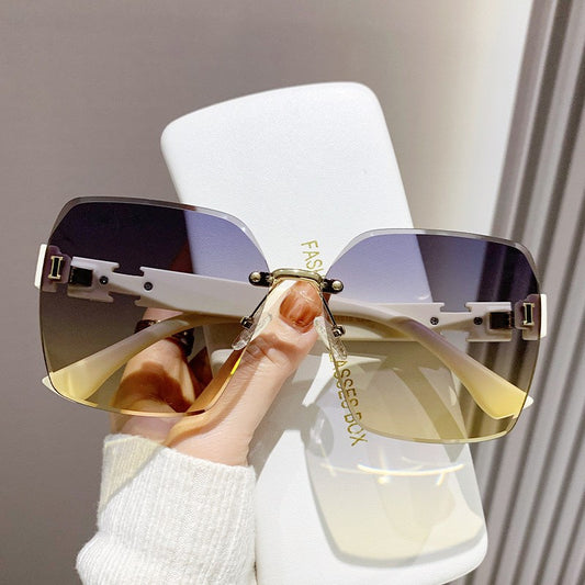 zp432-Women's high-end rimless anti-UV sunglasses